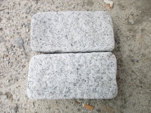 g601 wit granieten geplaveide keien